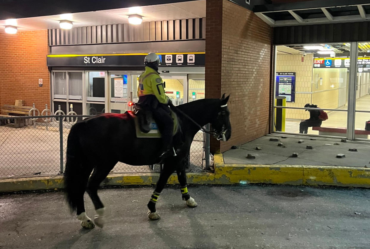 A Toronto police officer seen on a police horse outside of Toronto's St. Clair subway station.