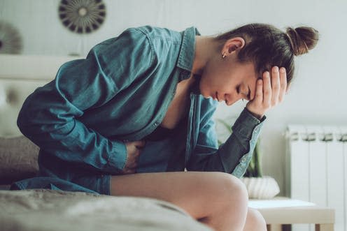 <span class="caption">Many women are told not to complain about pain.</span> <span class="attribution"><a class="link " href="https://www.shutterstock.com/image-photo/sad-unhappy-woman-suffering-pms-menstruation-1357975841" rel="nofollow noopener" target="_blank" data-ylk="slk:goffkein.pro/ Shutterstock;elm:context_link;itc:0;sec:content-canvas">goffkein.pro/ Shutterstock</a></span>