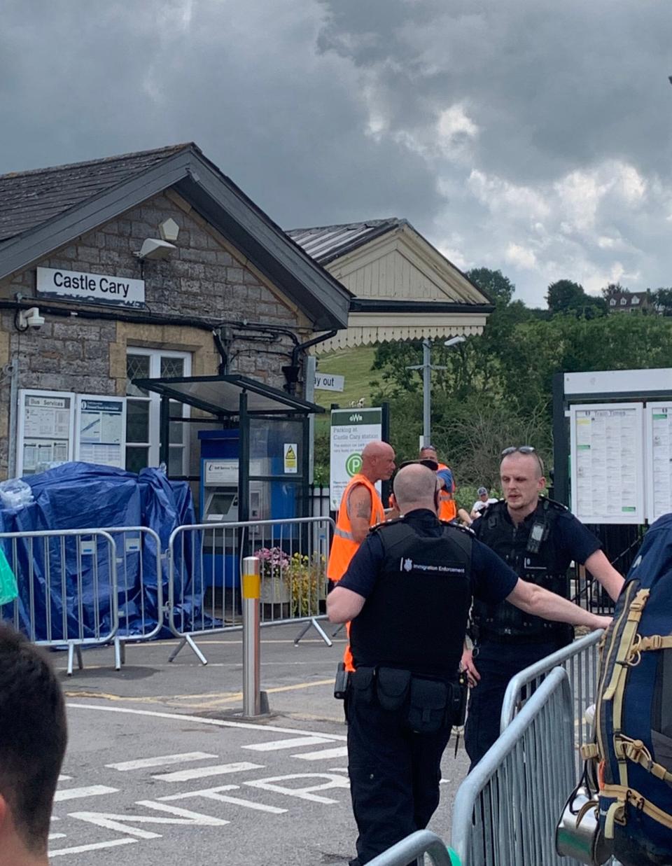 Immigration enforcement officers at Castle Cary station (Griff Ferris/Twitter)