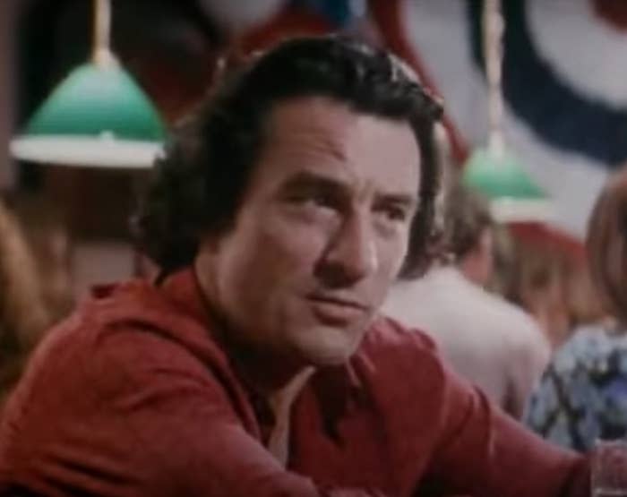 Robert De Niro as Max Cady sits at a bar in "Cape Fear"