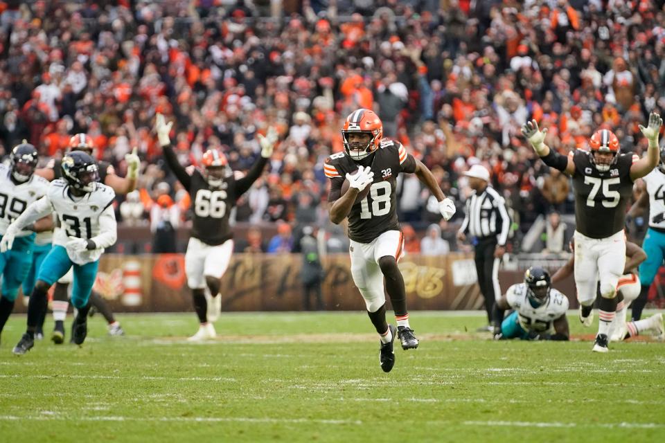 Cleveland Browns wide receiver David Bell (18) catches and runs 41-yards for a touchdown during the second half Sunday against the Jacksonville Jaguars in Cleveland.