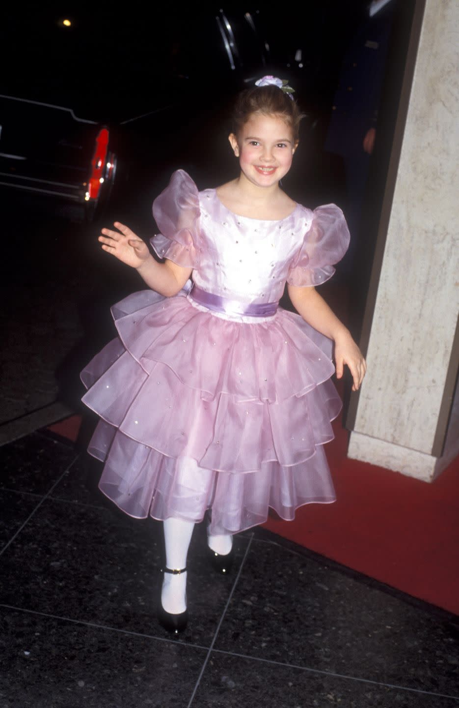 <p>Drew Barrymore in a fluffy pink party dress. </p>