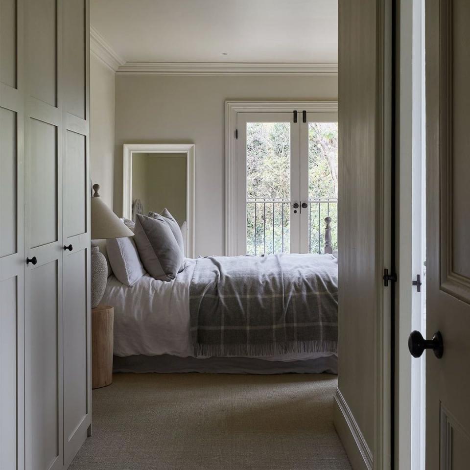 The principal bedroom has a Juliet-style balcony