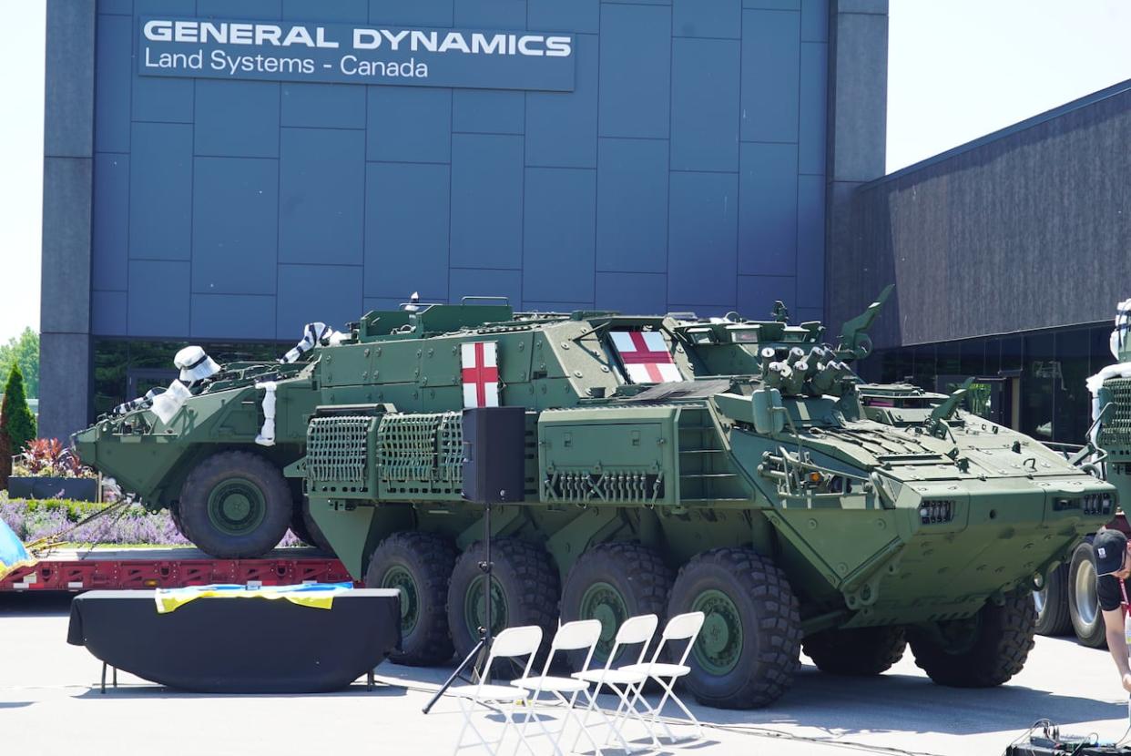 Armoured combat support vehicles (ACSVs), seen at an event on Wednesday at the General Dynamics Land Systems manufacucturing facility in London, Ont., are ready to be sent to the Ukrainian army.  (Alessio Donnini/CBC News - image credit)