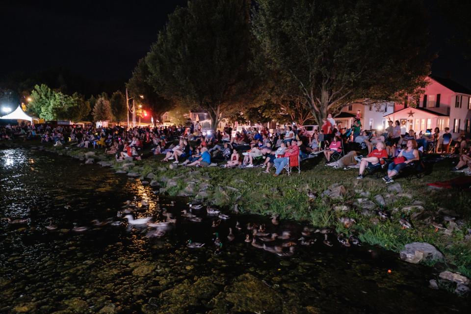 People take in the fireworks show during the 2021 First Town Days Festival at Tuscora Park.