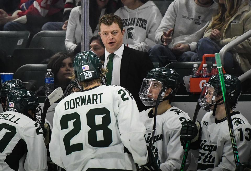 MSU hockey coach Adam Nightingale instructs his Spartans Friday, Feb. 10, 2023, during the rivalry faceoff against U-M at Munn Ice Arena. The Wolverines won 4-2.