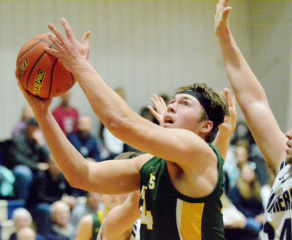 Northwestern's Chase Neiber eyes the basket during a high school basketball doubleheader on Thursday, Feb. 9, 2023 in Watertown.