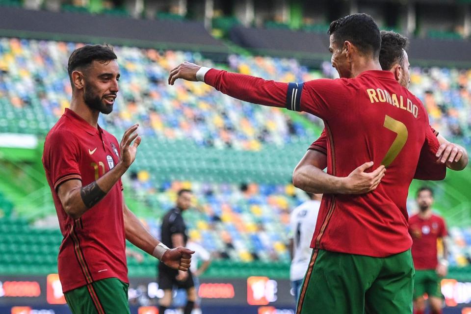 Fernandes and Ronaldo celebrate (AFP via Getty Images)