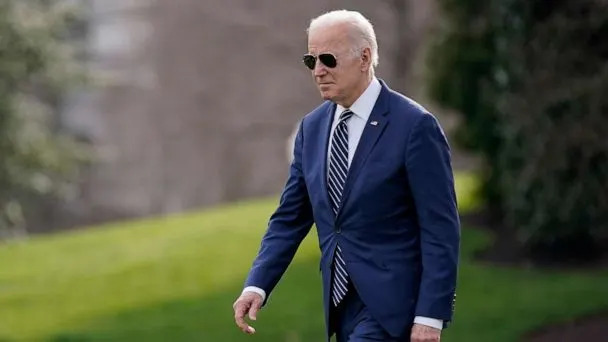 PHOTO: President Joe Biden walks on the South Lawn of the White House before boarding Marine One, March 18, 2022. (Patrick Semansky/AP)