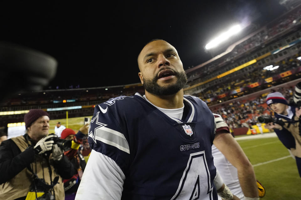 Dallas Cowboys quarterback Dak Prescott (4) leaving the field at the end of an NFL football game against the Washington Commanders, Sunday, Jan. 8, 2023, in Landover, Md. Washington won 26-6. (AP Photo/Alex Brandon)