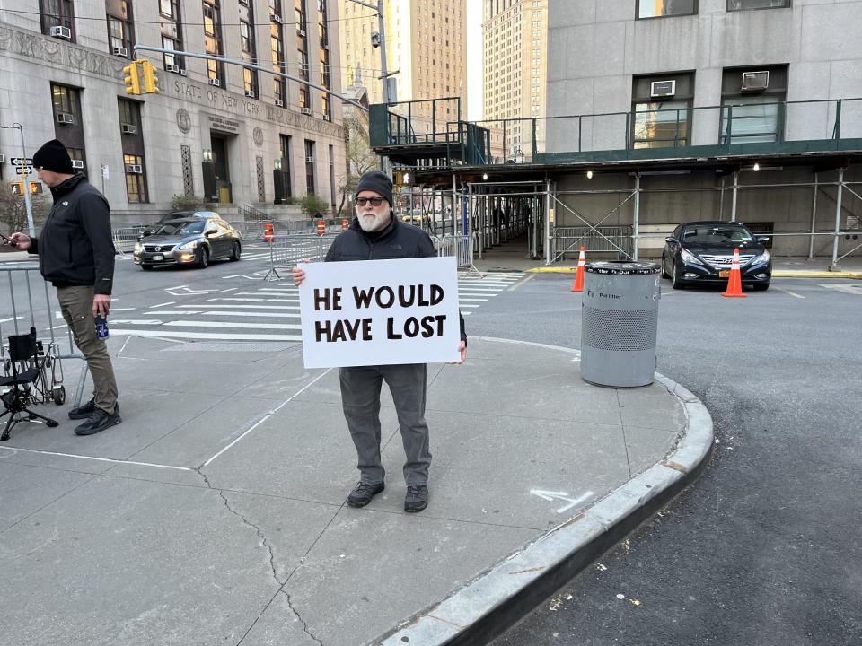 A demonstrator outside the Manhattan courthouse on Monday.