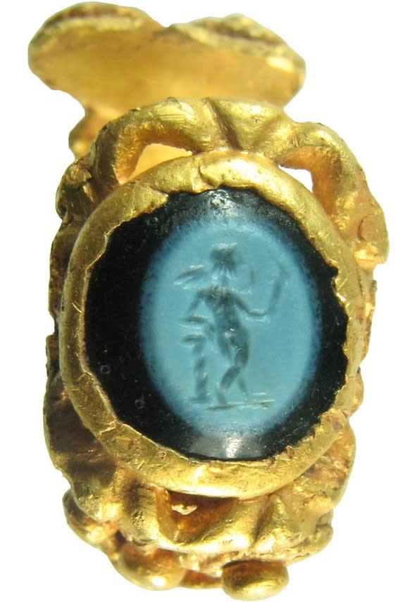 A 1,700-year-old gold ring with a stone showing Cupid carrying a torch would've been worn on the finger of a man or woman at a time when the Roman Empire controlled England.