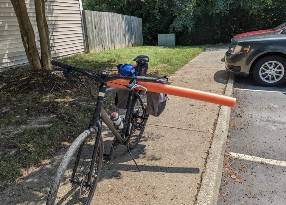 One cyclist decided to attach a pool noodle to their bike to ensure cars didn't get too close on the road. Source: Reddit