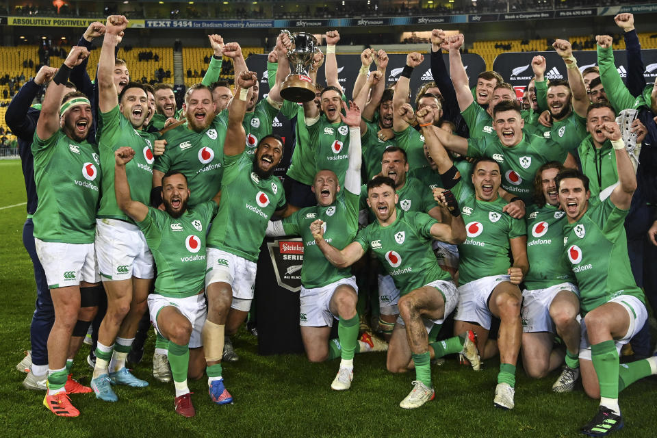 FILE - Ireland players celebrate after their first ever series win over New Zealand following the third rugby international between the All Blacks and Ireland in Wellington, New Zealand, Saturday, July 16, 2022. Top-ranked Ireland and host nation France both provide compelling reasons to believe that the southern hemisphere's 16-year hold on the Rugby World Cup might come to an end this year. (Andrew Cornaga/Photosport via AP, File)