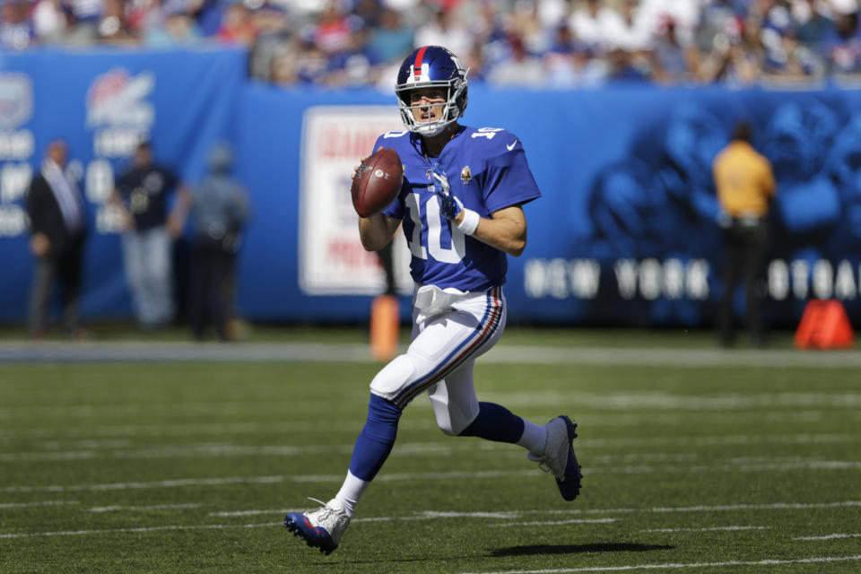 New York Giants quarterback Eli Manning looks to pass while under pressure during the second half of an NFL football game against the Buffalo Bills, Sunday, Sept. 15, 2019, in East Rutherford, N.J. (AP Photo/Adam Hunger)