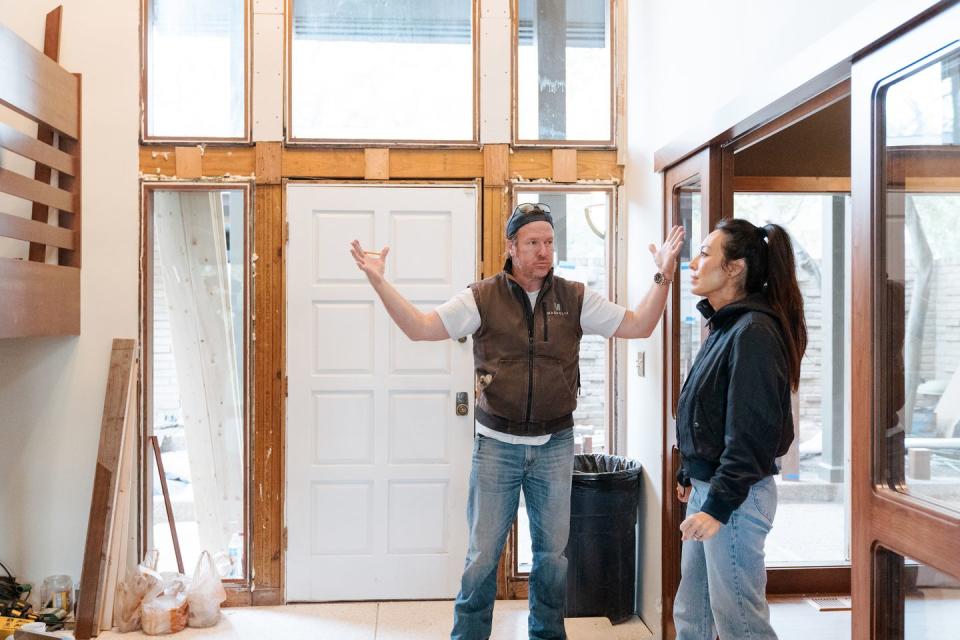 hosts, chip and joanna gaines discuss the progress of staircase, as seen on fixer upper the lakehouse