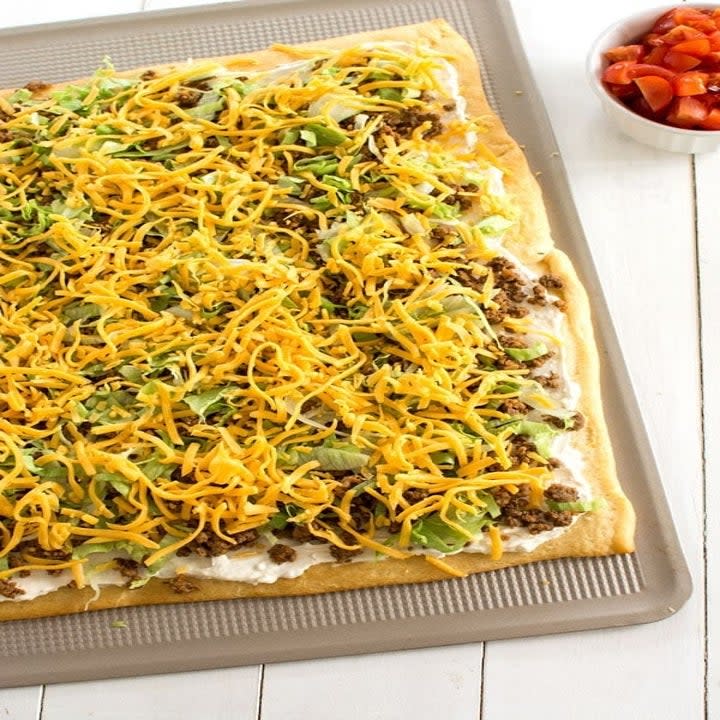 Taco pizza ready for the oven.
