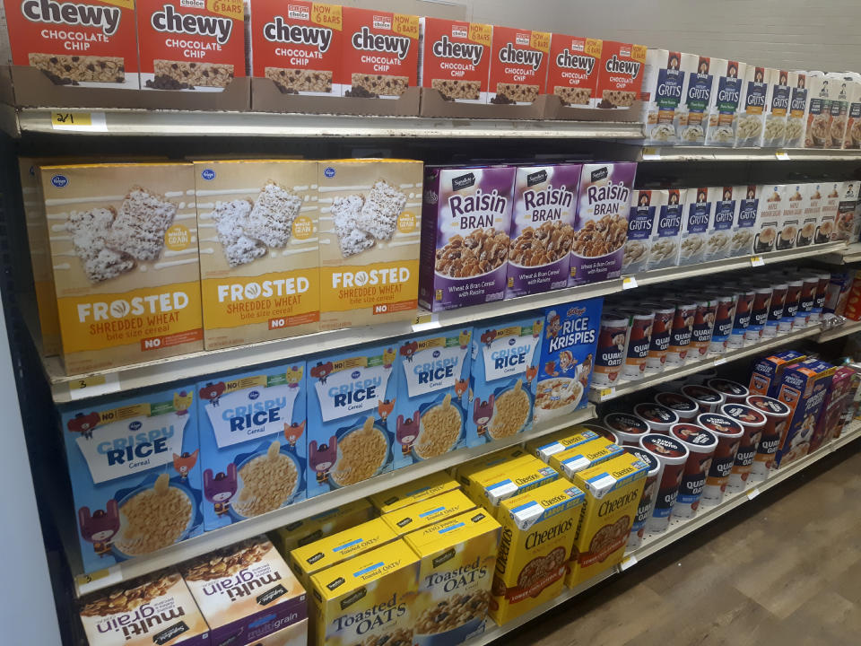 In this photo provided by Paul Juarez, cereal and other foods line the shelves of Linda Tutt High School's student-led grocery store on Nov. 20, 2020, in Sanger, Texas. (Paul Juarez via AP)