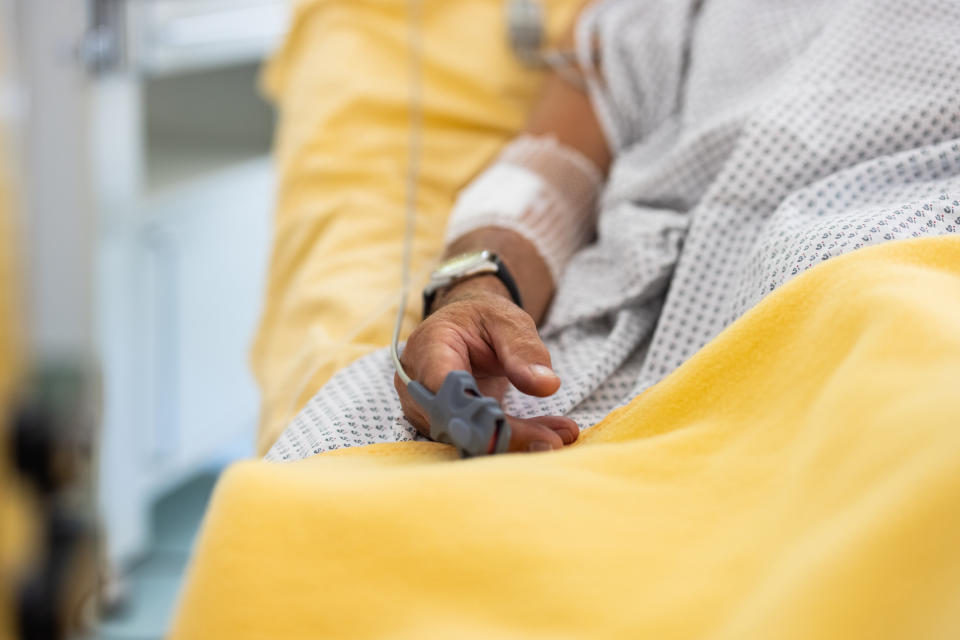 closeup of a hand in a hosptial bed