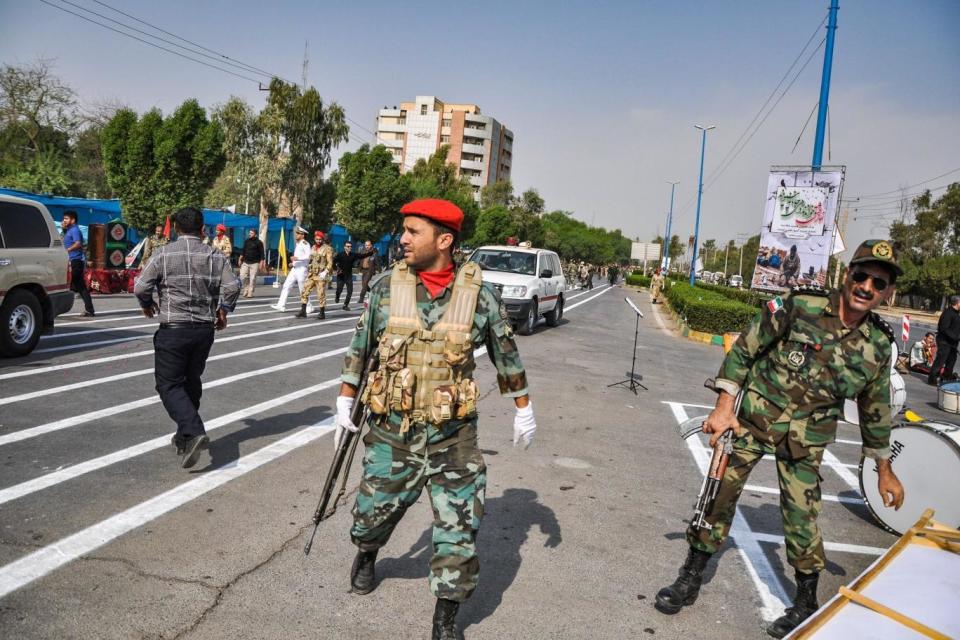 Soldiers at the scene of the attack on the military parade (AFP/Getty Images)