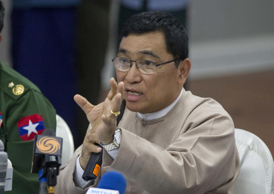 Myanmar Social Welfare Minister Win Myat Aye talks to journalists during a press briefing of recent developments in Rakhine State including arrangements for repatriation of displaced persons, Sunday, Nov. 11, 2018, in Yangon, Myanmar. (AP Photo/Thein Zaw)