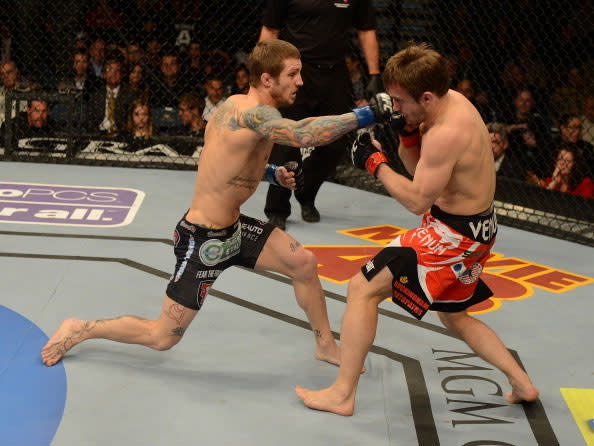 (L-R) Eddie Wineland versus Brad Pickett during their bantamweight fight at UFC 155 on December 29, 2012 at MGM Grand Garden Arena in Las Vegas, Nevada. (Photo by Josh Hedges/Zuffa LLC/Zuffa LLC via Getty Images)