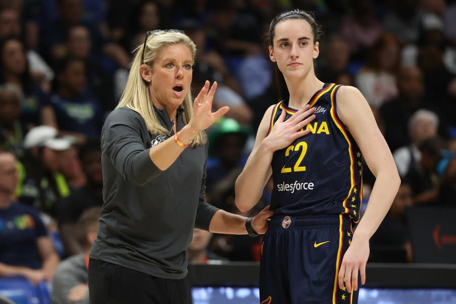 ARLINGTON, TEXAS – MAY 03: Caitlin Clark #22 of the Indiana Fever talks to head coach Christie Sides while playing the Dallas Wings during a pre season game at College Park Center on May 03, 2024 in Arlington, Texas. (Photo by Gregory Shamus/Getty Images)