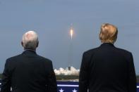 U.S. President Donald Trump and U.S. Vice President Mike Pence attend the launch of a SpaceX Falcon 9 rocket and Crew Dragon spacecraft, from Cape Canaveral