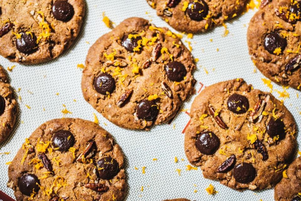 A batch of freshly baked chocolate chip cookies