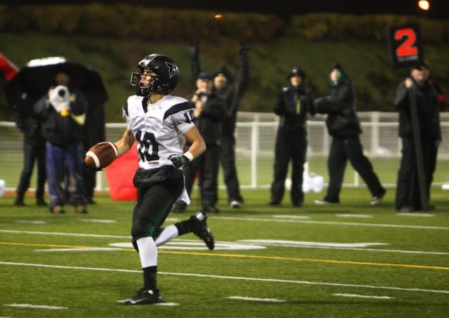 Manu Rasmussen scores an uncontested touchdown which nearly cost his Tigard team a playoff win — The Oregonian