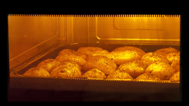 Potatoes baking in an oven