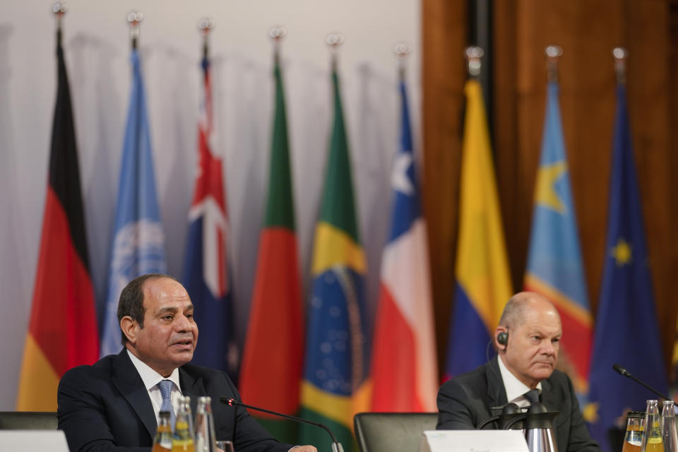 German Chancellor Olaf Scholz, right, and Egypt's President Abdel Fattah Al-Sisi attend the Petersberg Climate Dialogue conference at the Foreign Ministry in Berlin, Germany, Monday, July 18, 2022. (AP Photo/Markus Schreiber)