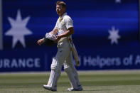 Australia's David Warner walks off after losing his wicket to the West Indies during their cricket test match in Adelaide, Thursday, Nov. 8, 2022. (AP Photo/James Elsby)