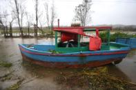 <p>Damaged boat is seen in Punta Alegre, northern coast of Ciego de Avila province of Cuba after Hurricane Irma passed through the area on Sept. 11, 2017. (Photo: Yander Zamora/Anadolu Agency/Getty Images) </p>