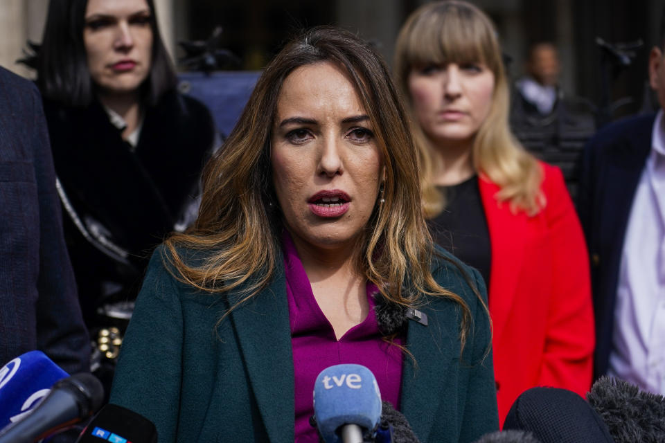 Stella Assange, wife of Wikileaks founder Julian Assange, releases a statement outside the Royal Courts of Justice, in London, Tuesday, March 26, 2024. Two High Court judges said they would grant Assange a new appeal unless U.S. authorities give further assurances about what will happen to him. The case has been adjourned until May 20.(AP Photo/Alberto Pezzali)