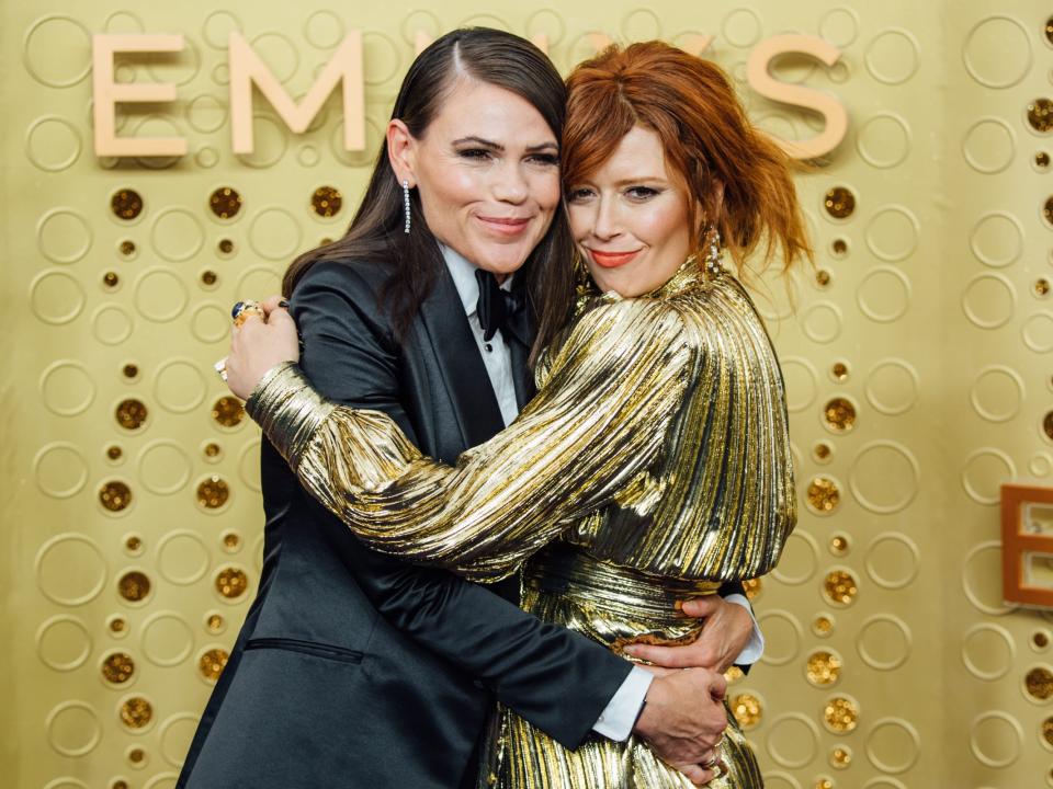 Clea DuVall and Natasha Lyonne hug and pose at the Emmys
