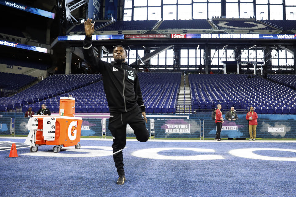Utah defensive back Javelin K. Guidry stretches at the NFL football scouting combine in Indianapolis, Sunday, March 1, 2020. (AP Photo/Charlie Neibergall)