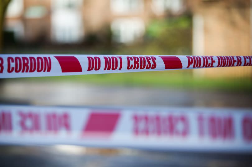 Police tapes at a crime scene in London