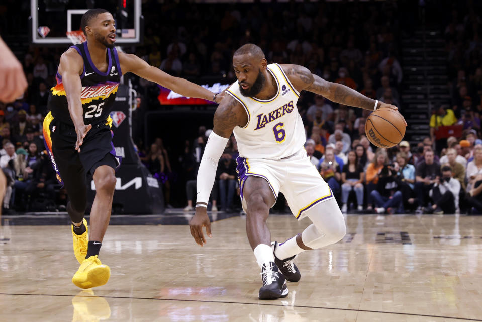 Phoenix's Mikal Bridges defends LeBron James of the Los Angeles Lakers during their game on March 13, 2022 in Phoenix. (Chris Coduto/Getty Images)