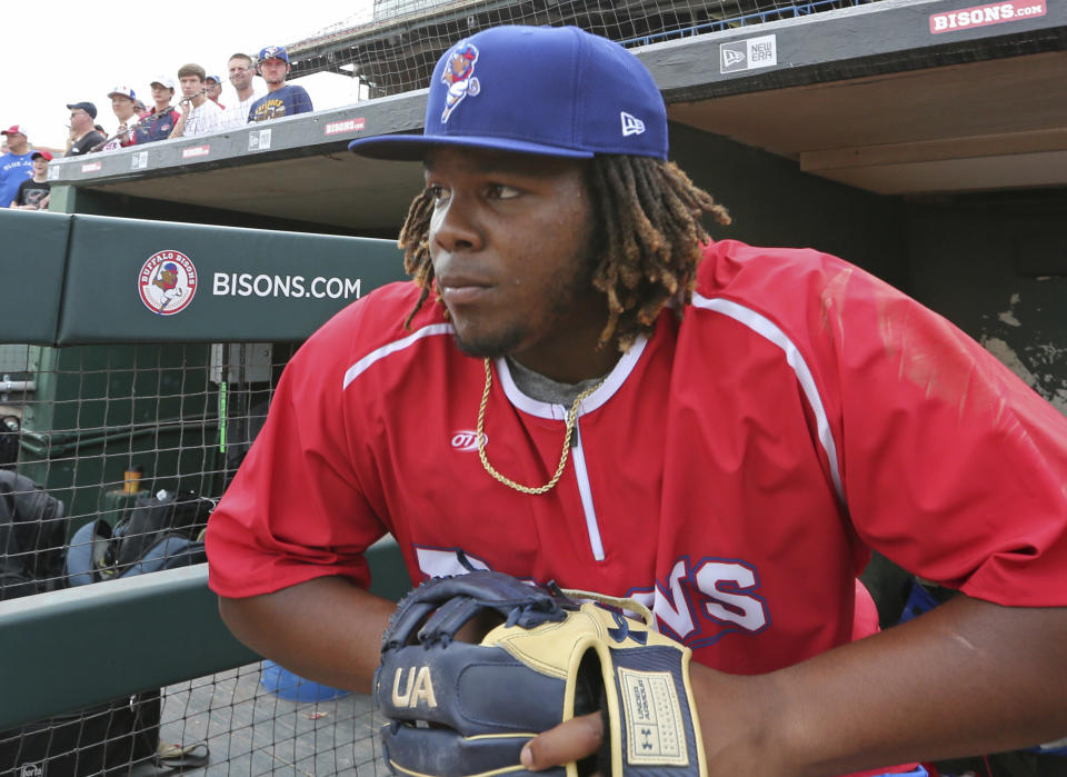 FILE - In this July 31, 2018, file photo, Buffalo Bisons third baseman Vladimir Guerrero Jr. looks on before a minor league baseball against the Lehigh Valley IronPigs in Buffalo, N.Y. The Toronto Blue Jays top prospect says he feels ready to finally make the jump to the majors, while adding the decision is out of his control. Blue Jays assistant general manager Joe Sheehan said this week the team is still evaluating when to make the move. (AP Photo/Jeffrey T. Barnes, File)