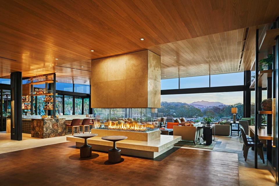 The modern bar and lobby area at the Montage Healdsburg hotel, with mountain views