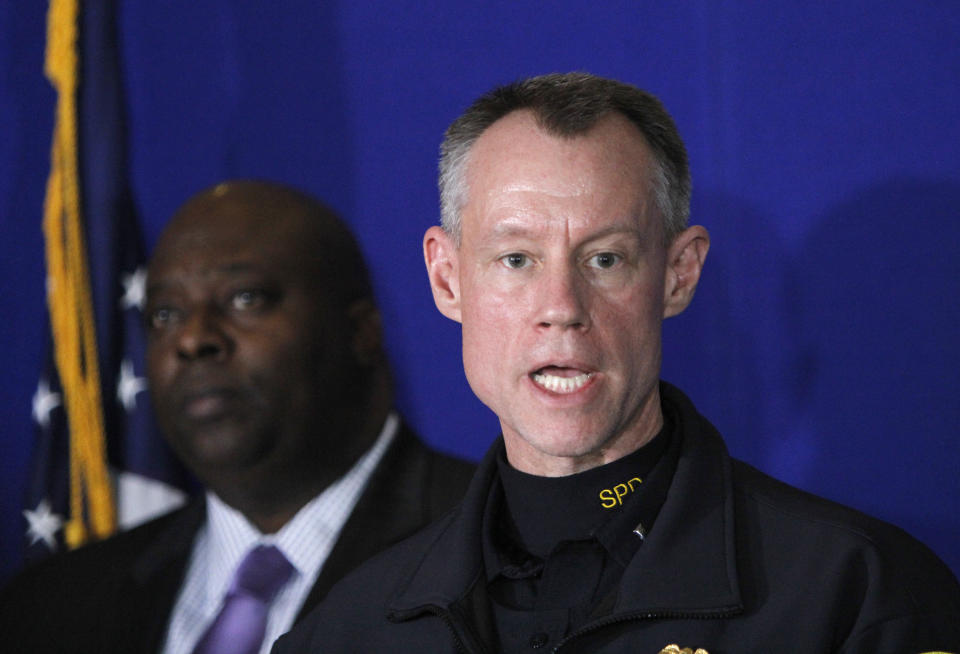 Syracuse Police Lt. David Brown, right, speaks at the Syracuse Police Department in Syracuse, N.Y., Thursday, Feb. 21, 2019, about Syracuse men's NCAA college basketball head coach Jim Boeheim's involvement in a fatal car accident where he struck and killed a man standing along an interstate in Syracuse. Boeheim struck and killed a man along an interstate late Wednesday night as he tried to avoid hitting the man's disabled vehicle, police say. (AP Photo/Nick Lisi)