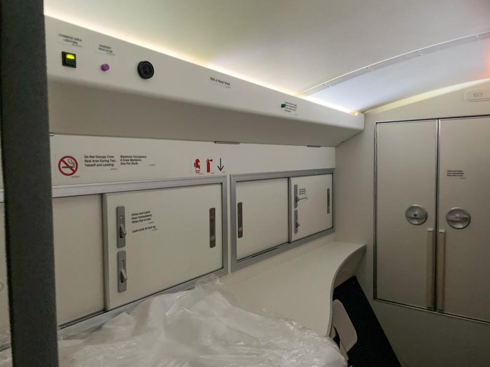 More storage for the flight attendants while they sleep.