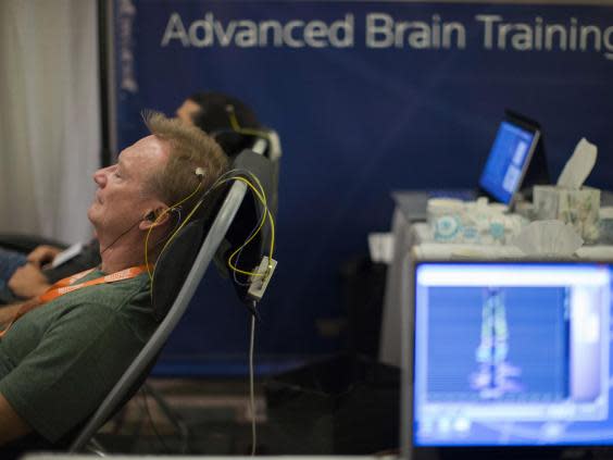 A neuro-feedback session at the Bulletproof Biohacking Conference, 2014: attendees don an EEG headband to ‘train the flexibility of the brain’ (Reuters)