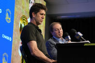 Golden State Warriors owner Joe Lacob, right, talks about president and general manager Bob Myers, left, during an NBA basketball news conference in San Francisco, Tuesday, May 30, 2023. Myers is departing the Warriors after building a championship team that captured four titles in an eight-year span. One of the most successful GMs over the past decade in any sport, Myers' contract was set to expire in late June. (AP Photo/Eric Risberg)