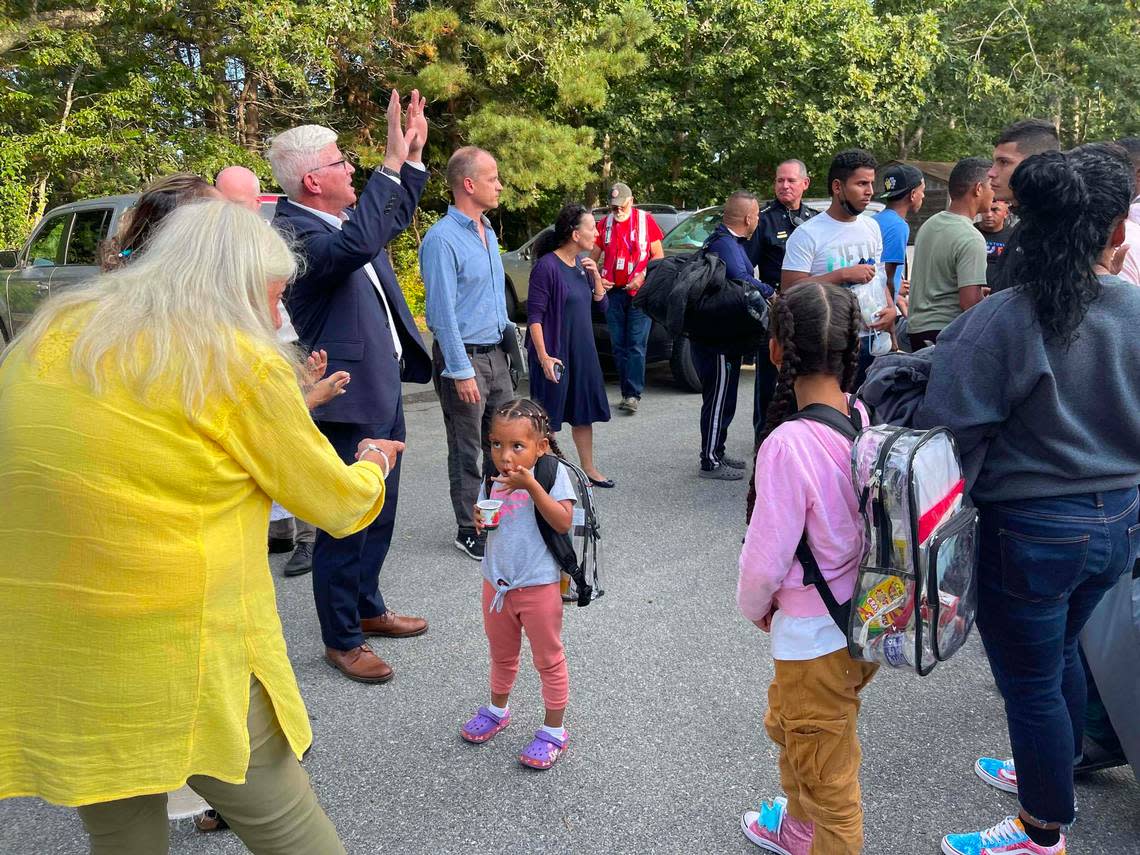 Sheriff Robert Ogden speaks to newly arrived migrants outside a community services center in Martha’s Vineyard, Massachusetts, on Wednesday, Sept. 14, 2022.