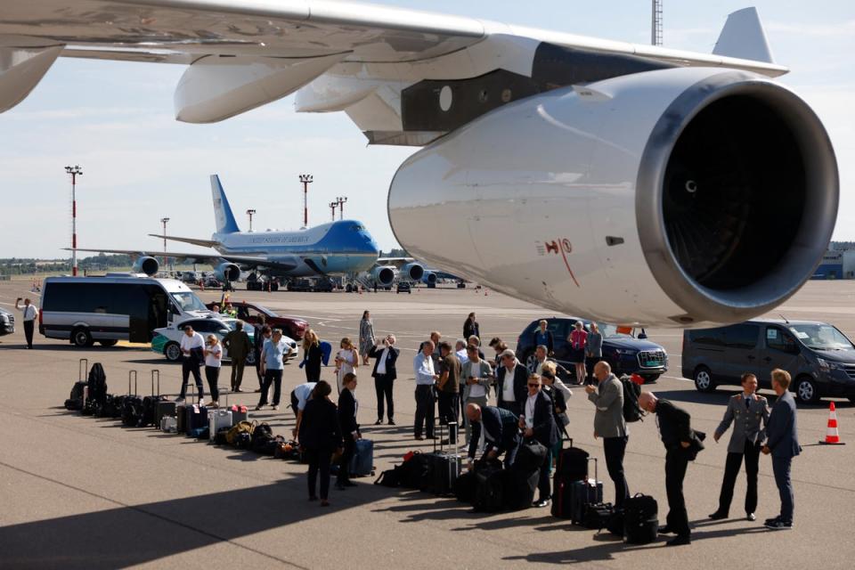 The luggage of the German delegation is lined up to be checked by sniffer dogs of the German Police assigned as security to German Chancellor Olaf Scholz’ plane before bording the flight back to Berlin with Joe Biden’s plane Air Force One in the background, from the Nato Summit in Vilnius (AFP via Getty Images)