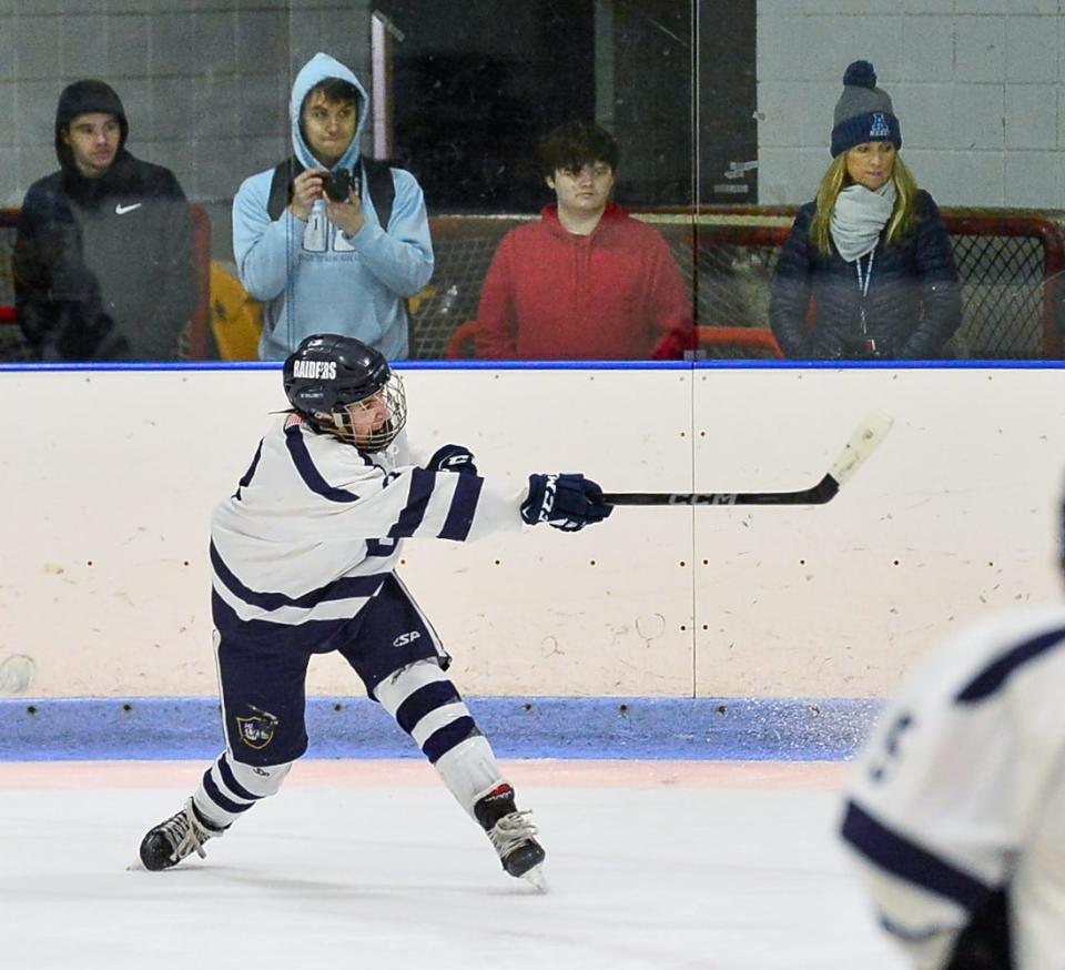 Somerset Berkley’s Davis Sullivan scores during the first period against Auburn on Wednesday, March 1.