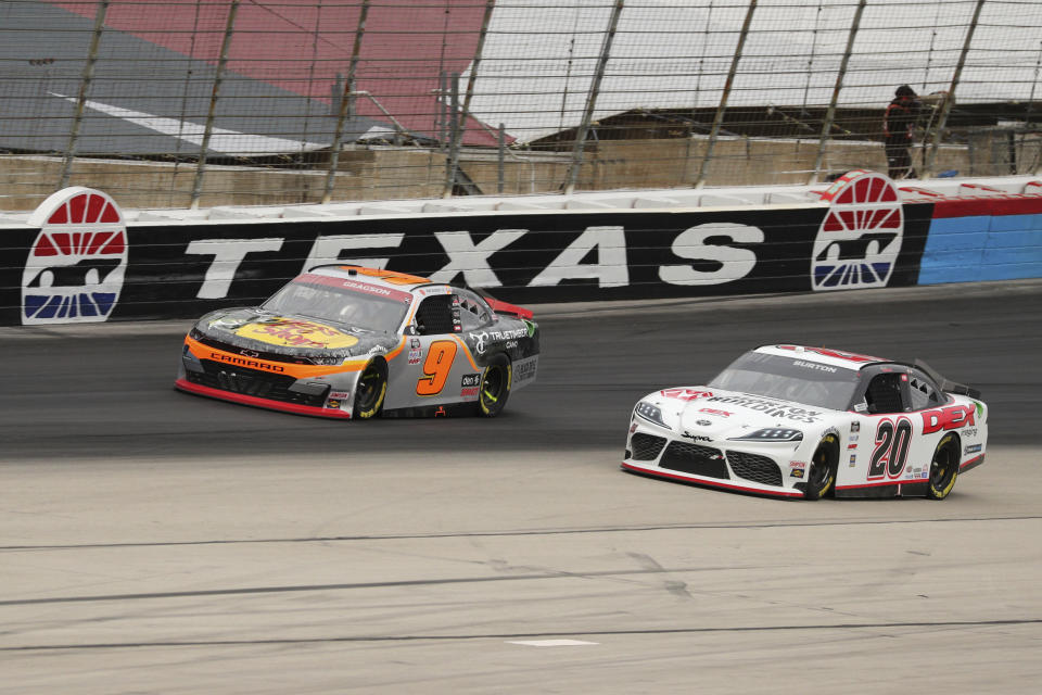 Noah Gragson (9) and Harrison Burton (20) come out of turn four onto the front stretch during a NASCAR Xfinity Series auto race at Texas Motor Speedway in Fort Worth, Texas, Saturday Oct. 24, 2020. (AP Photo/Richard W. Rodriguez)