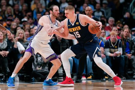 Feb 13, 2019; Denver, CO, USA; Sacramento Kings center Kosta Koufos (41) guards Denver Nuggets center Nikola Jokic (15) in the fourth quarter at the Pepsi Center. Isaiah J. Downing-USA TODAY Sports